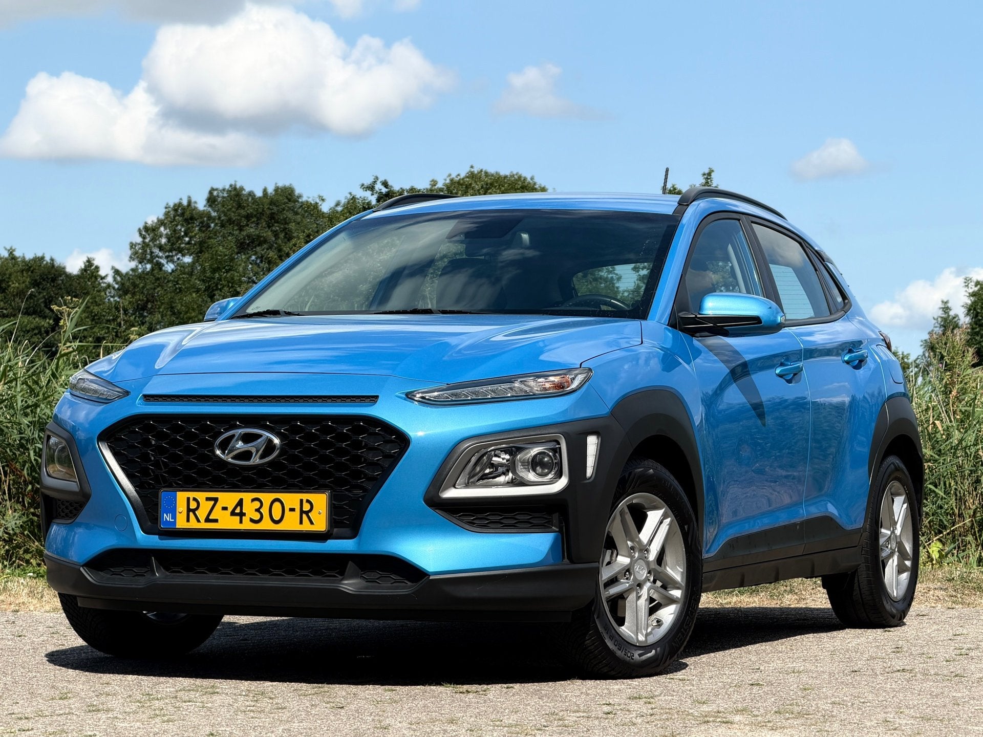 Hyundai Kona 1.0T Comfort Plus Pack - Blue Lagoon - Carplay/, Auto's, Hyundai, Voorwielaandrijving, Dealer onderhouden, Stof, Gebruikt