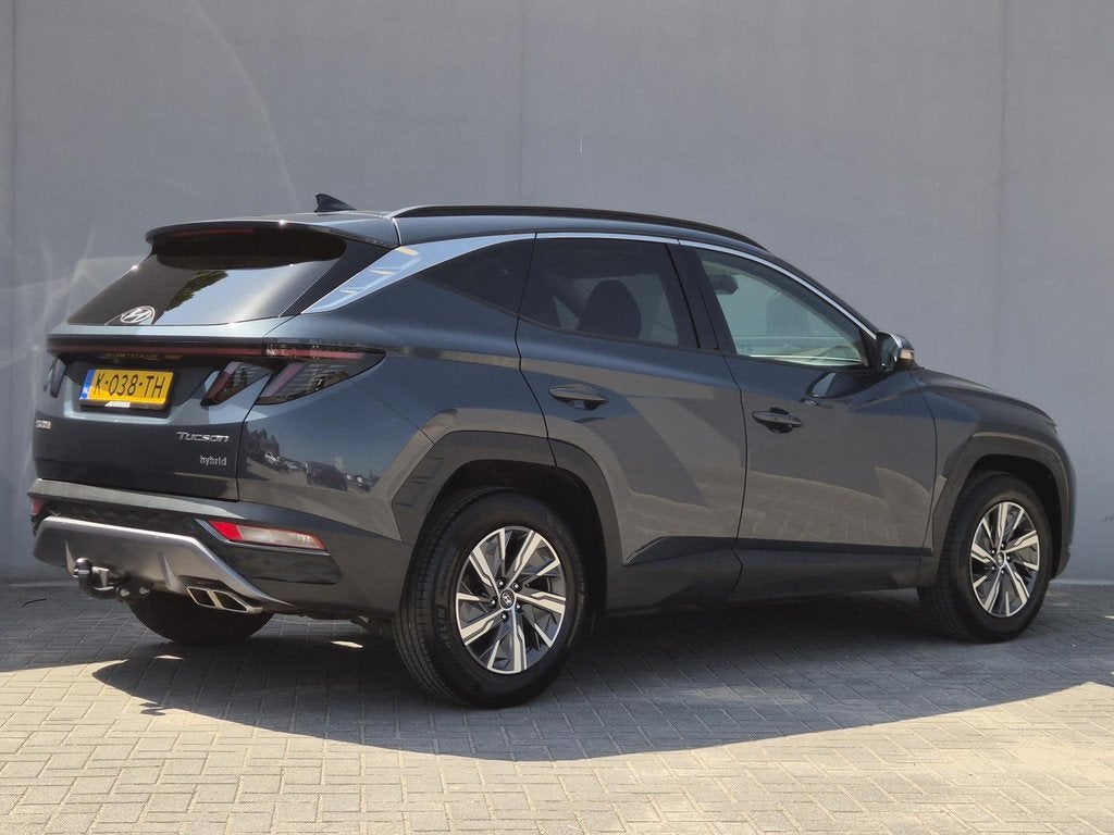 Hyundai Tucson 1.6 T-GDI HEV Comfort Smart / trekhaak vast /, Auto's, Hyundai, Stof, Gebruikt, Euro 6, 4 cilinders