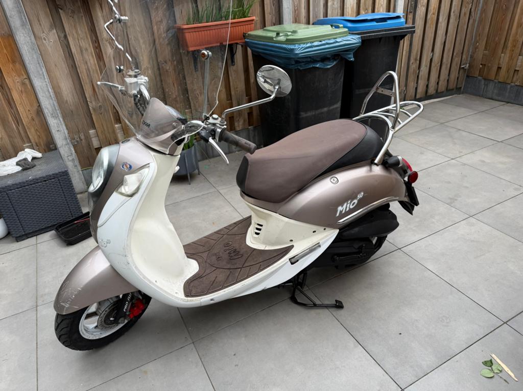Sym mio 50 snor scooter blauw kenteken, Fietsen en Brommers, Scooters | SYM, Ophalen of Verzenden, Gebruikt, Benzine, Mio