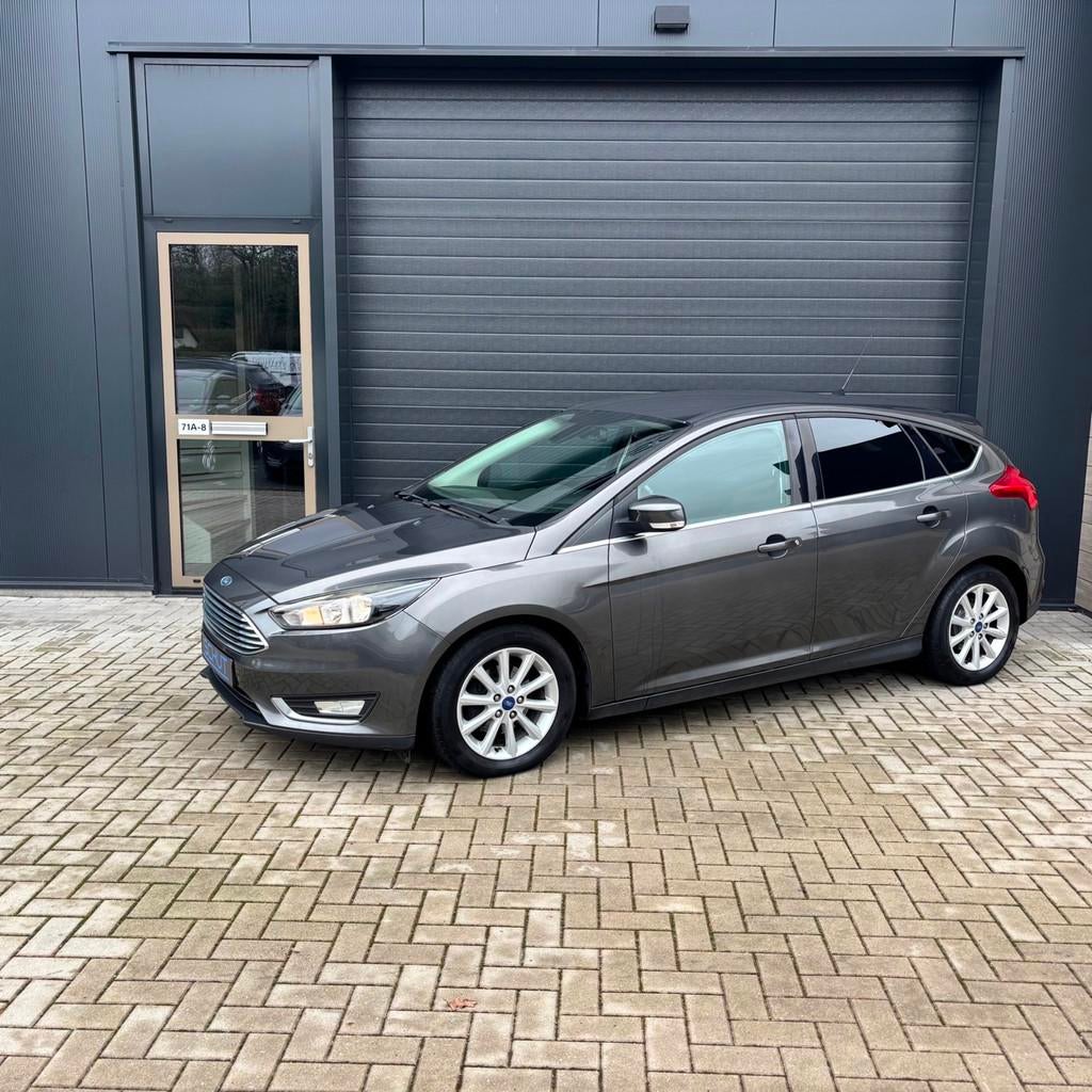 Ford Focus 125pk Titanium CLIMA | NAVI |CRUISE CONTROL | STO, Auto's, Ford, Zwart, Bedrijf, Handgeschakeld, Zilver of Grijs