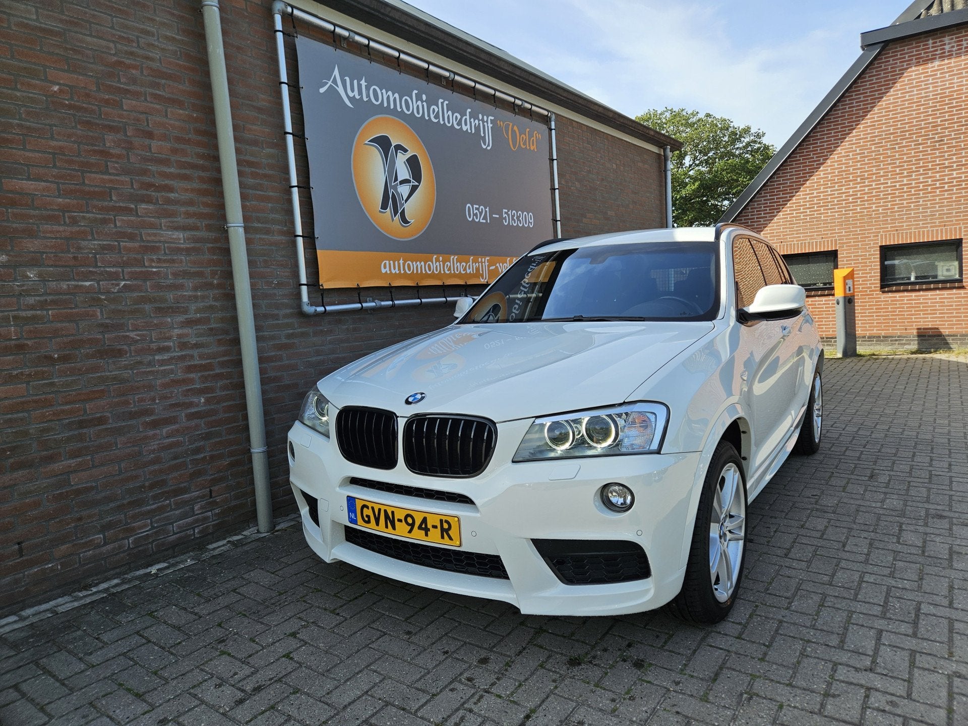 BMW X3 xDrive20i High Executive M-sport (bj 2014, automaat), Auto's, Gebruikt, 4 cilinders, 2000 kg, Leder en Stof