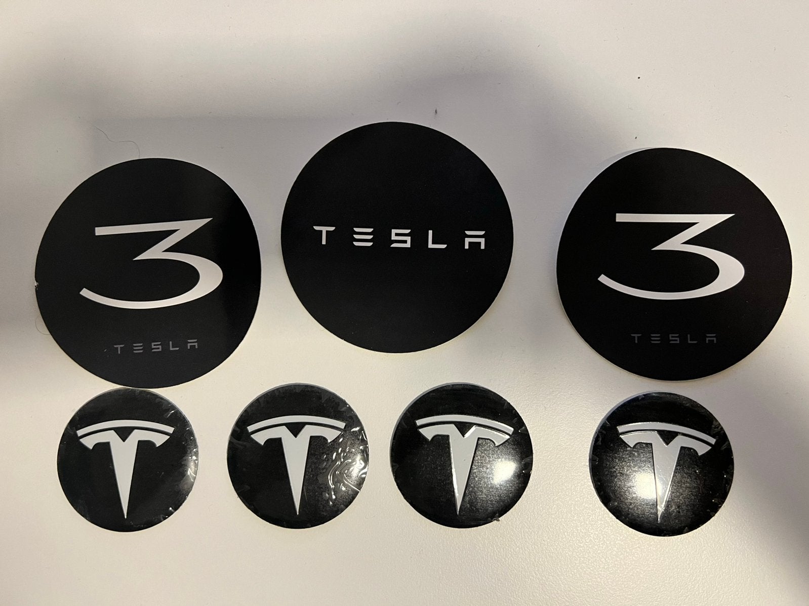 Tesla Model 3 logo stickers en wielnaafdoppen, Ophalen of Verzenden, Nieuw