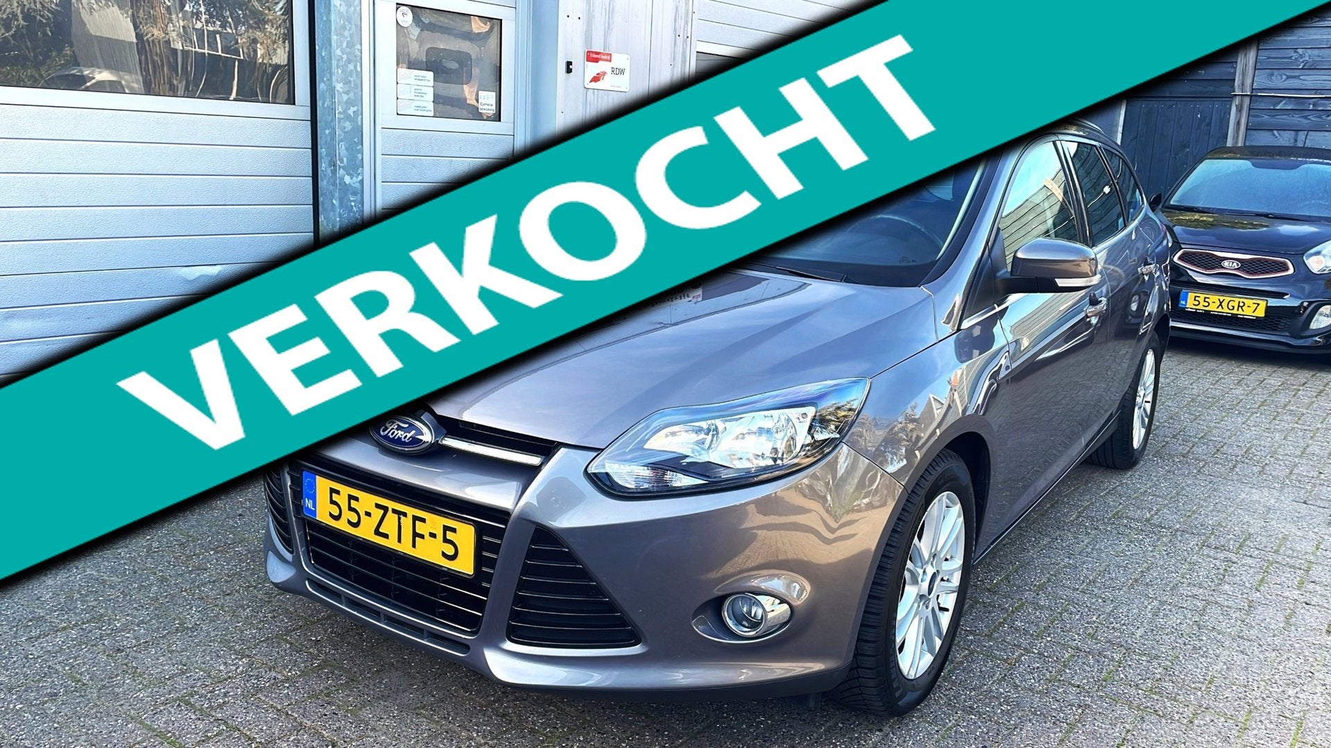 Ford Focus Wagon 1.0 EcoBoost Titanium-Navi-Clima-Trekhaak, Auto's, Gebruikt, Bruin, Handgeschakeld, Grijs