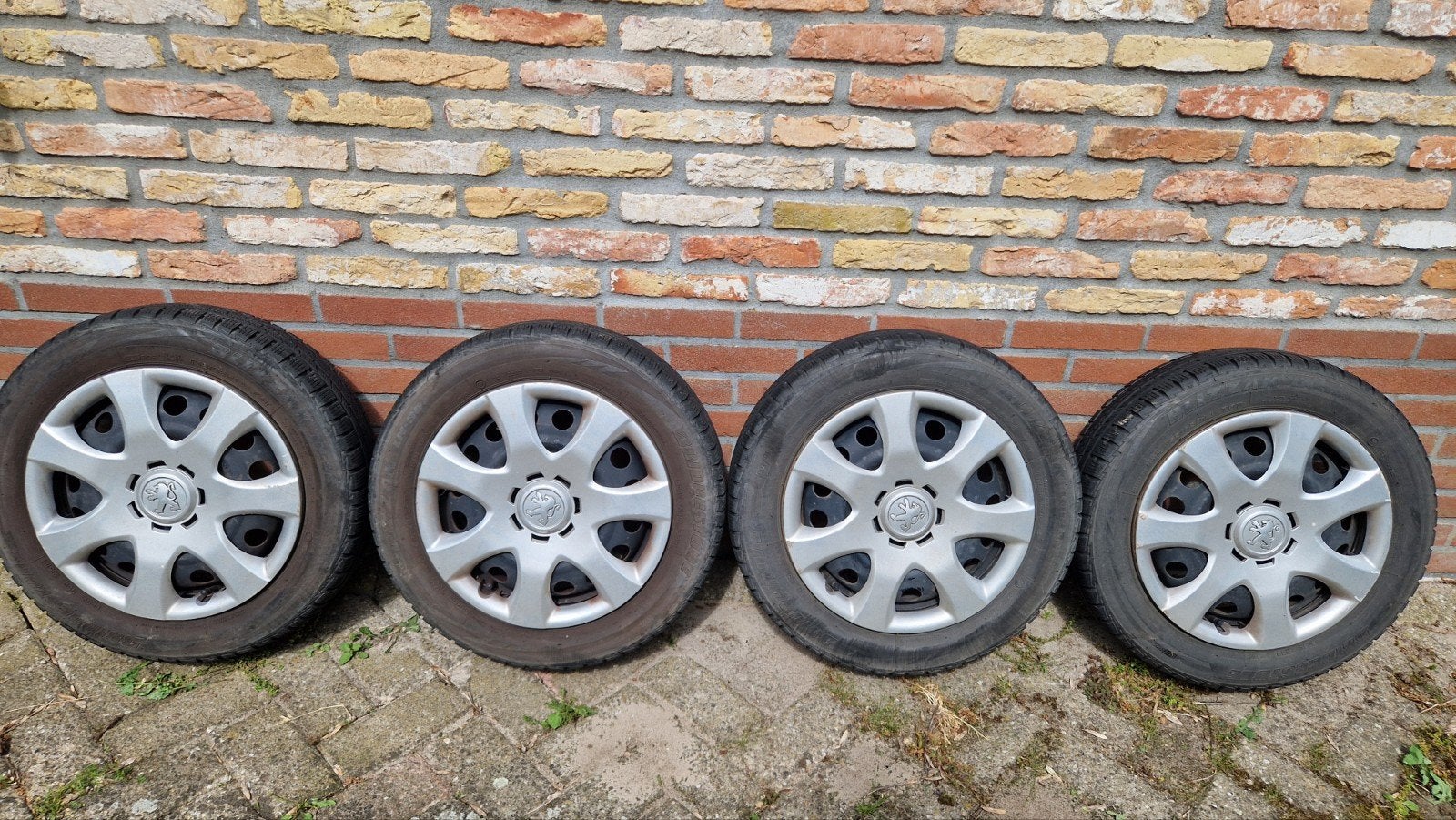 Set Bridgetonewinterbanden voor o.a. Peugeot 107. 155/65/R14, Ophalen, 14 inch, Gebruikt, 155 mm