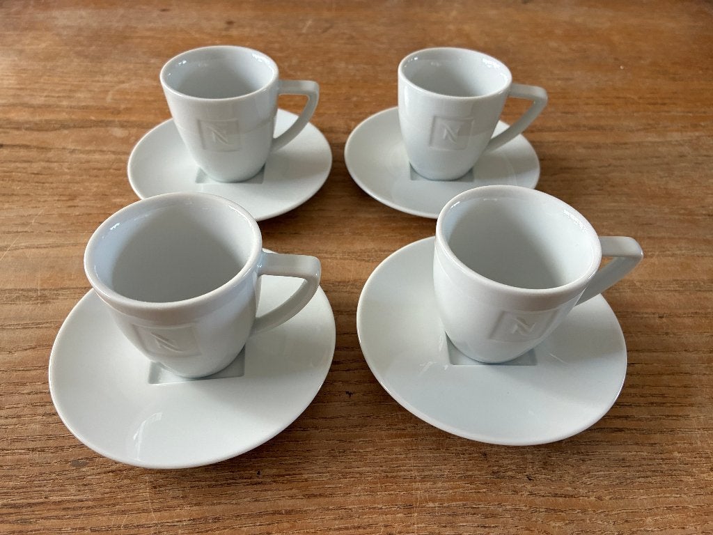 4x Nespresso espresso kopjes met schoteltje - wit - zgan, Huis en Inrichting, Overige merken, Keramiek, Ophalen of Verzenden, Zo goed als nieuw