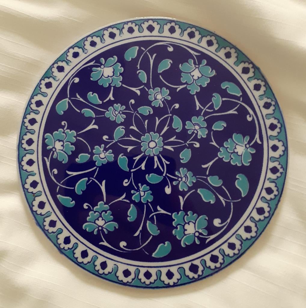 Onderzetter blauw rond tegel *eureka*, Huis en Inrichting, Woonaccessoires | Onderzetters, Ophalen of Verzenden, Zo goed als nieuw
