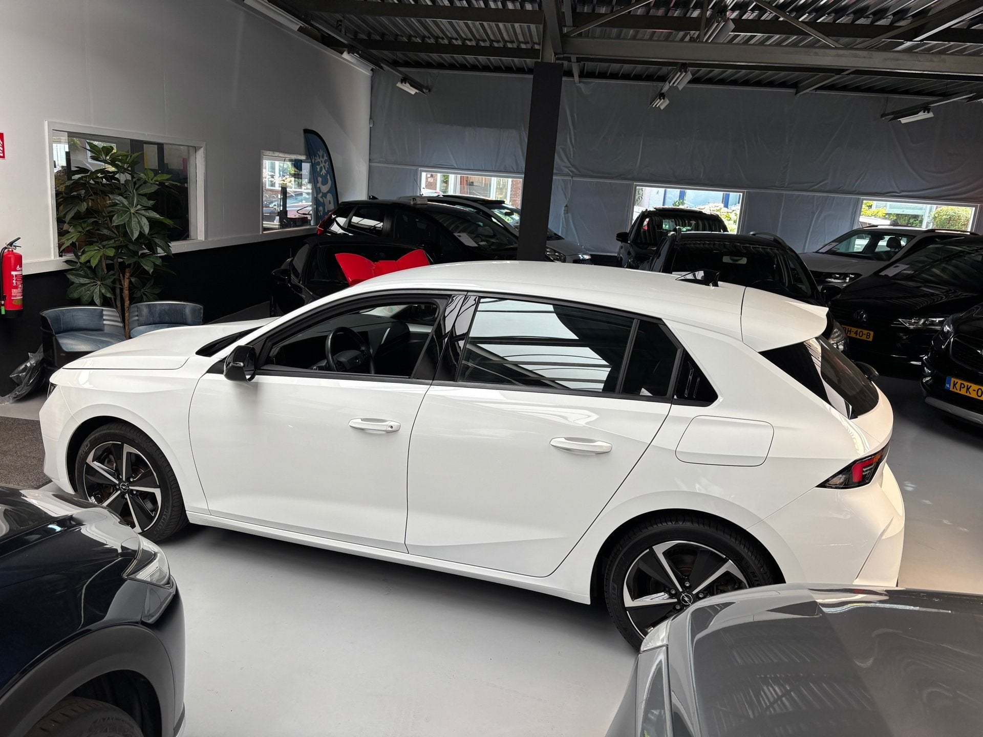 Opel ASTRA 1.6 Hybrid Edition Carplay, Gebruikt, Met garantie (alle), Wit, Plug-in hybride
