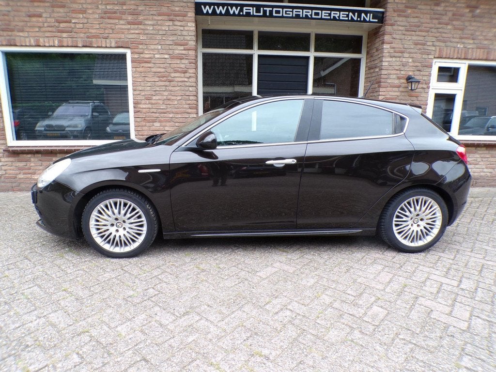 Alfa Romeo Giulietta 1.4 T Distinctive Automaat, Auto's, Alfa Romeo, Euro 5, Stof, Zwart, 4 cilinders