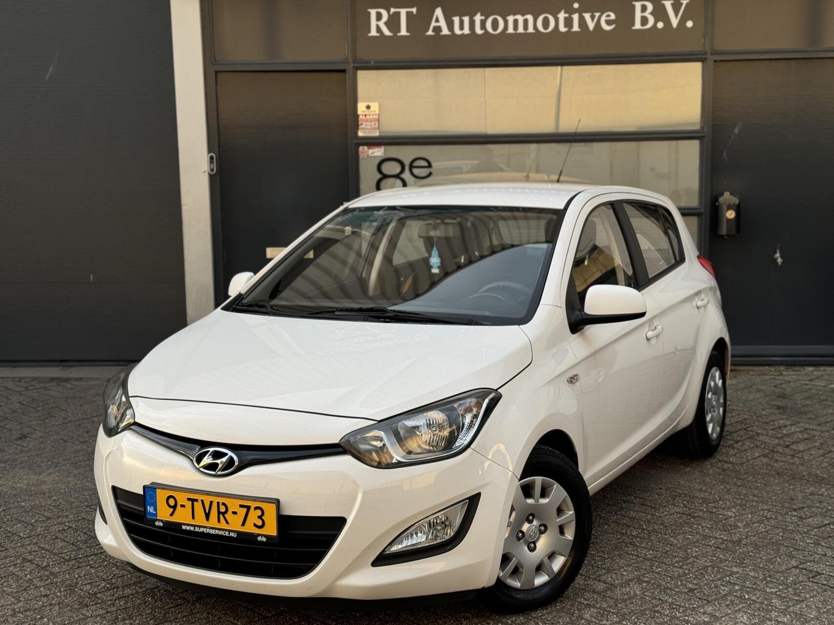 Hyundai i20 1.2i i-Motion Airco / Trekhaak 5Drs, Auto's, Euro 5, Gebruikt, 31 €/maand, 4 cilinders