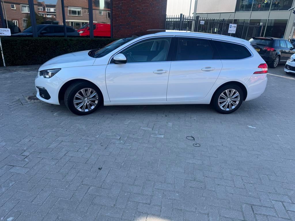 Peugeot 308 1.2 E-thp 96KW/130PK SW AUT 2018 Wit, Auto's, Peugeot, 1199 cc, 635 kg, Wit, Origineel Nederlands