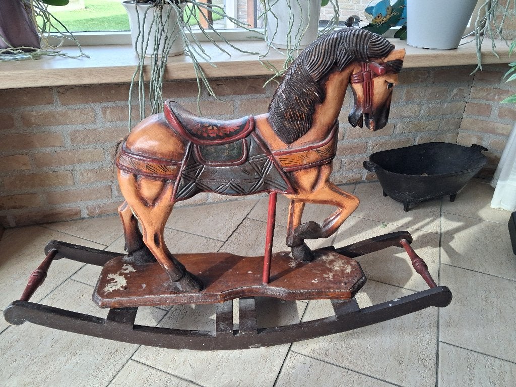 antiek hobbelpaard, Ophalen