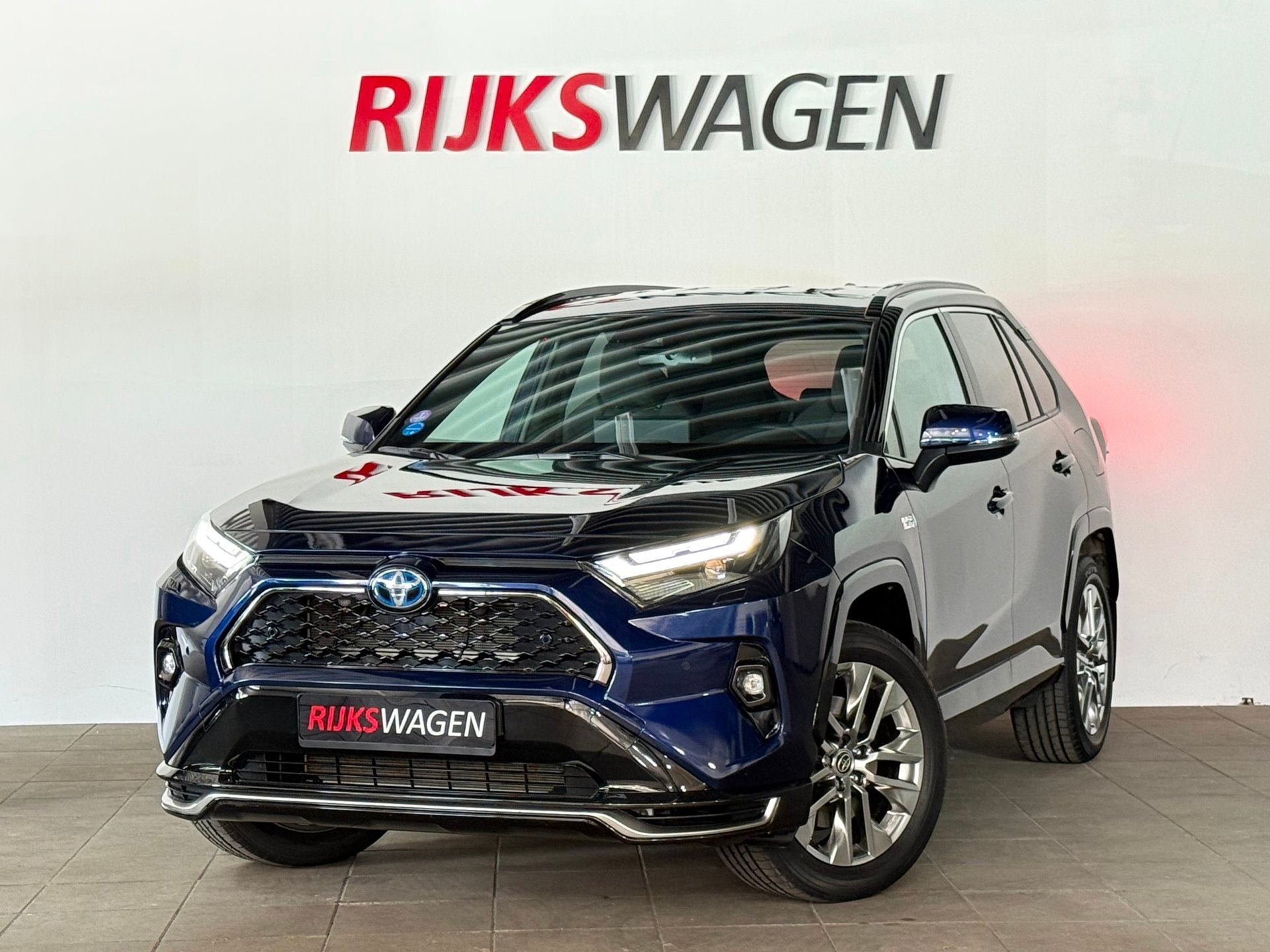 Toyota RAV4 2.5 Plug-in Hybrid AWD Style Parelmoer/Chrome ve, Auto's, Automaat, Dealer onderhouden, Gebruikt, Zwart