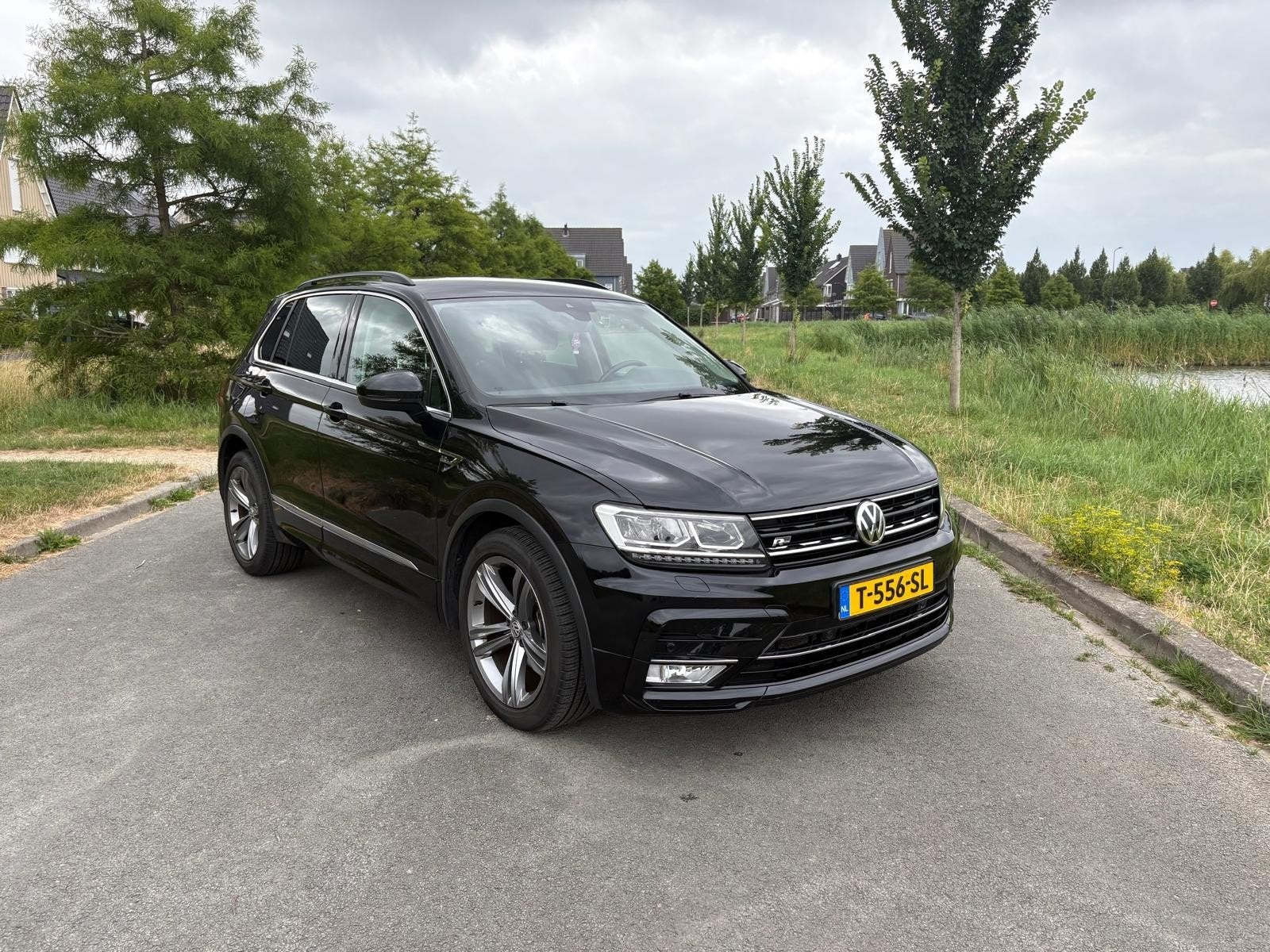 Volkswagen Tiguan 1.4 TSI 110KW/150PK My16 2016 Zwart, Auto's, Voorwielaandrijving, 1800 kg, 4 cilinders, Zwart