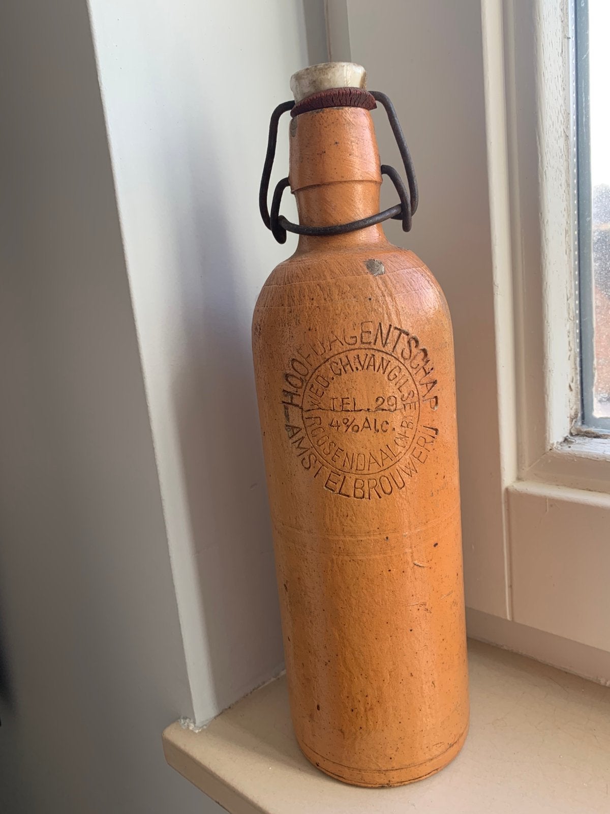 Amstel bierkruik met beugel Roosendaal 100 jaar oud, Ophalen of Verzenden