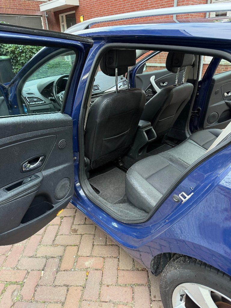 Foto 15 van Renault Mégane 1.5 DCI 81KW Estate 2012 met winterbanden