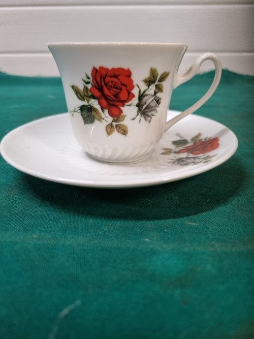 kop en schotel kronster rode roos, Antiek en Kunst, Antiek | Servies los, Ophalen of Verzenden
