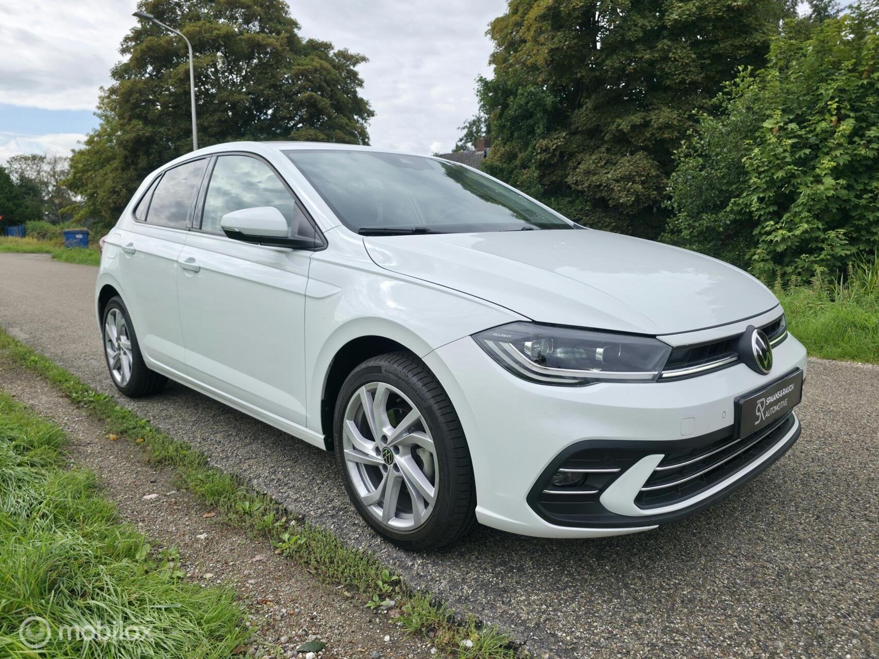 Volkswagen Polo 1.0 TSI / Alcantara / Stoelv / Navi / Carpl., Auto's, Gebruikt, Zwart, 95 pk, Wit