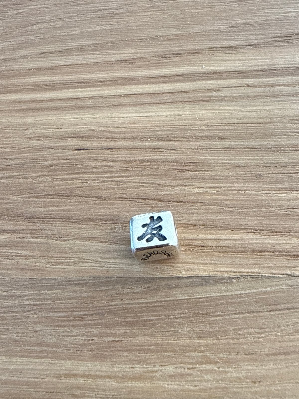 Zilveren bedel met Chinees teken 'Vriend', Overige merken, Ophalen of Verzenden, Zo goed als nieuw, 1 bedel