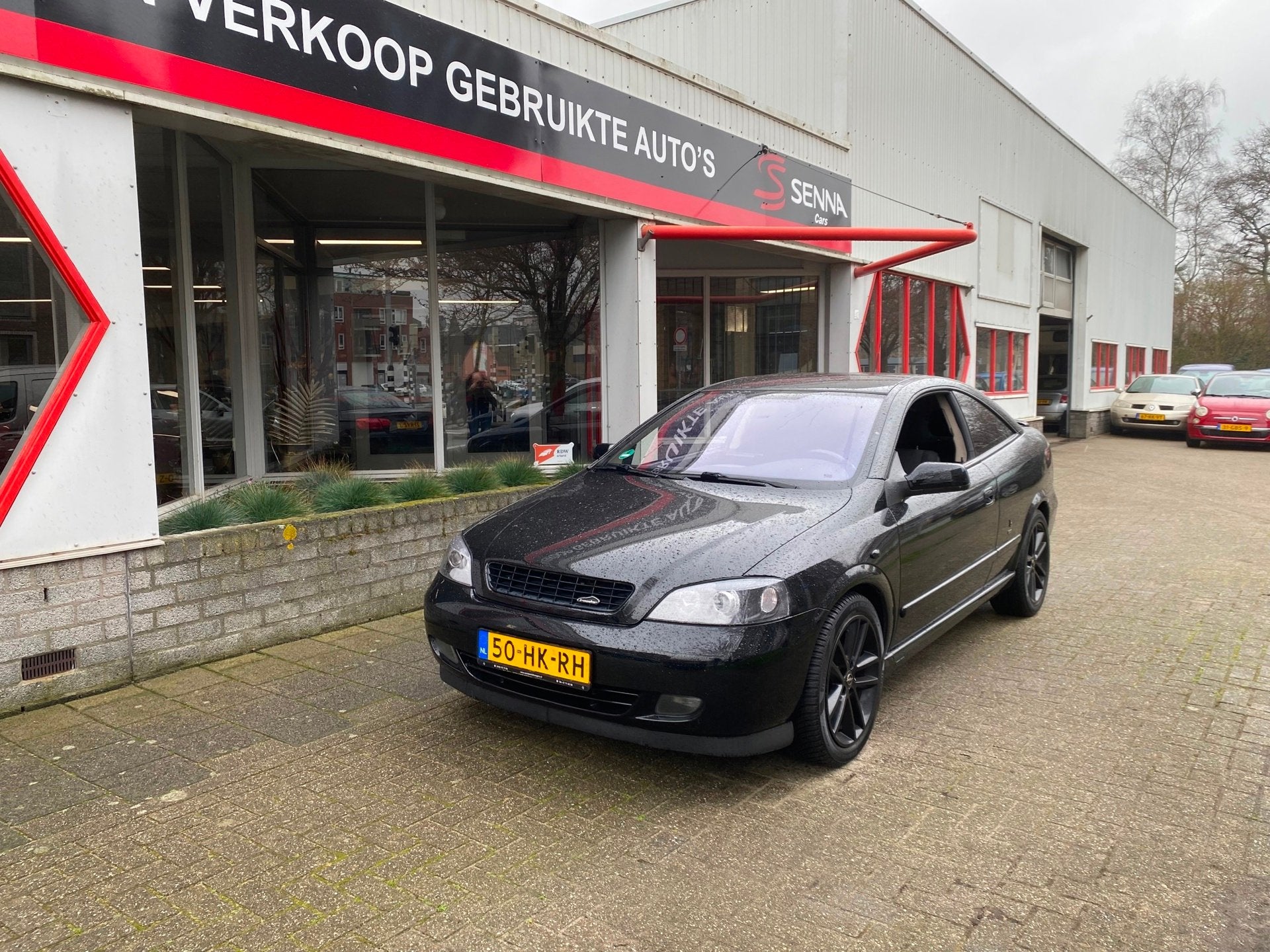Opel Astra Coupé 2.2-16V - Full Black Edition - Inruil Mog, Auto's, Voorwielaandrijving, Metallic lak, Gebruikt, 4 stoelen