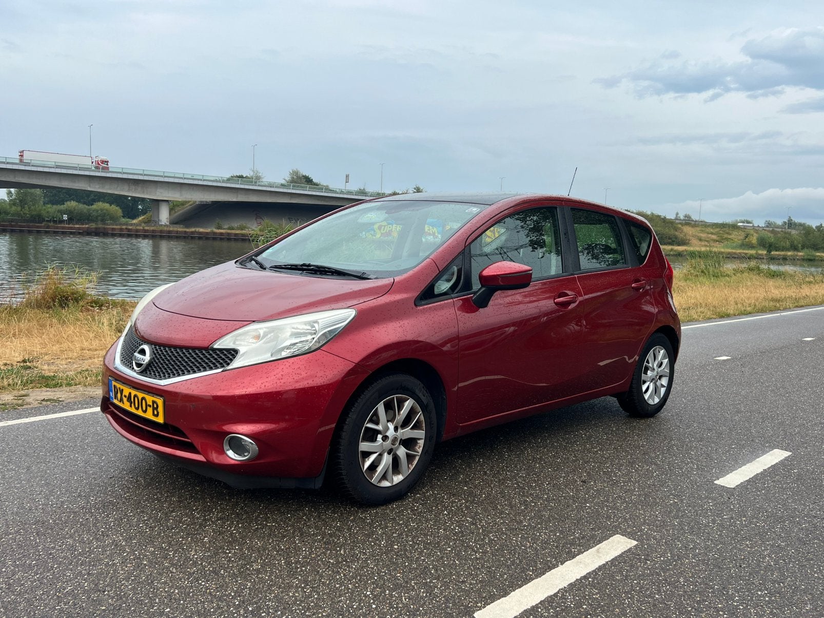 Nissan Note 1.2 59KW/80PK 2013 Rood, 1198 cc, Bedrijf, Handgeschakeld, 3 cilinders