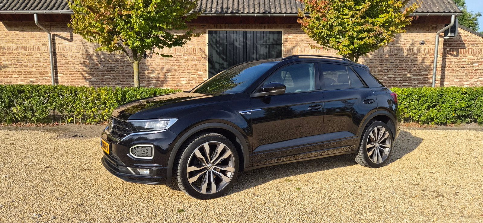 Volkswagen T-Roc Black-Line 2.0TSI 4Motion 2x R-line 7-DSG, Automaat, Stof, Zwart, 1984 cc