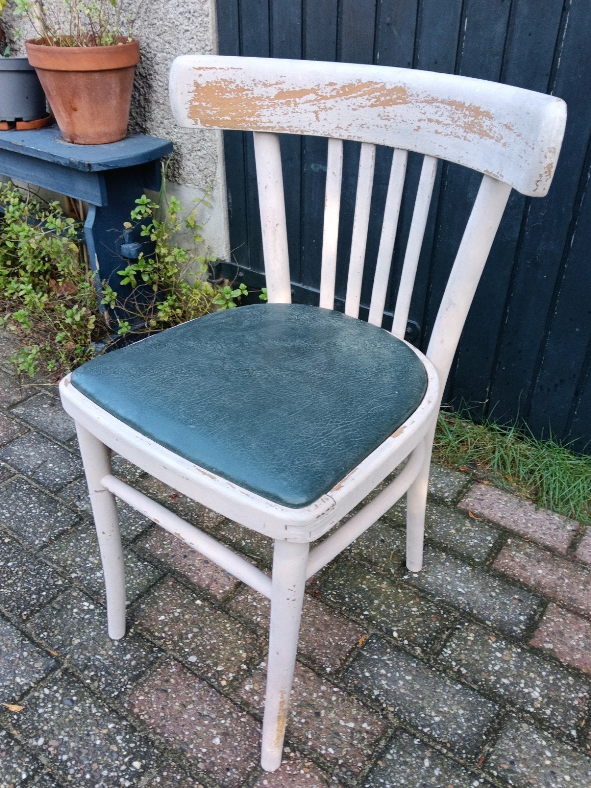 oude cafe stoel, Ophalen