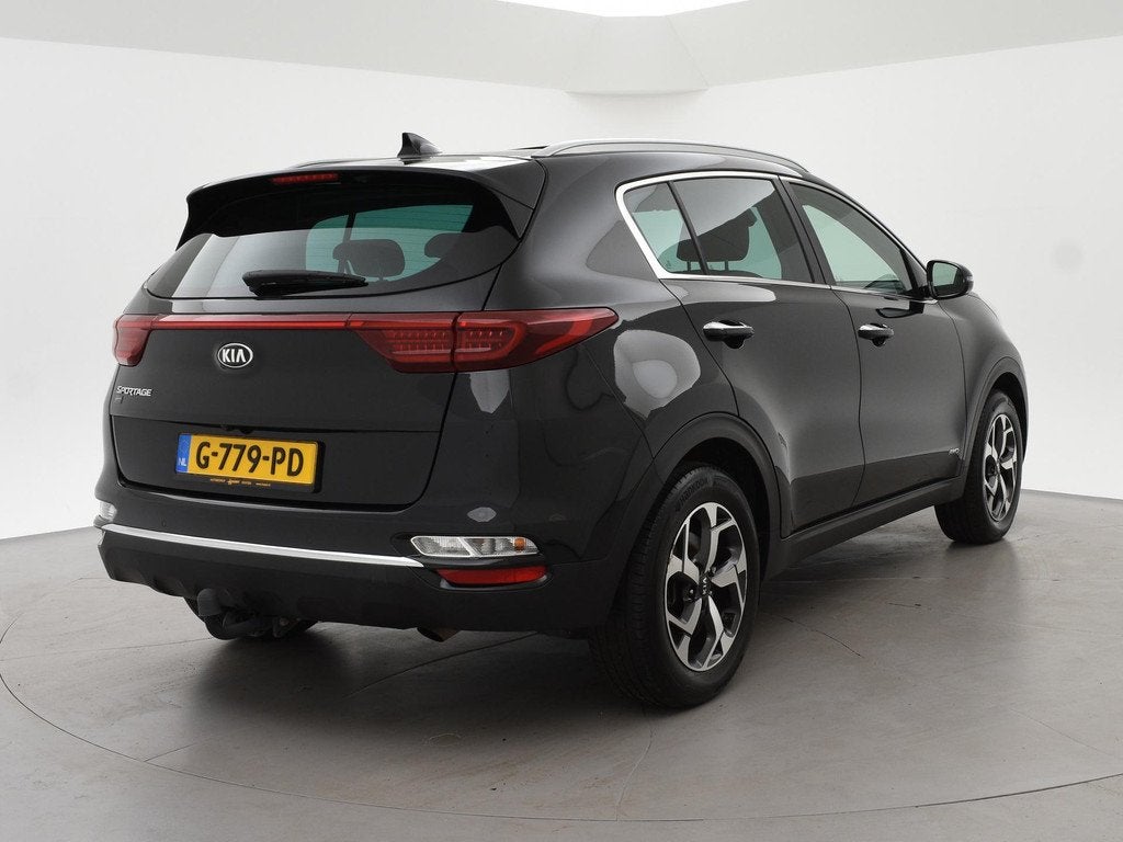 Kia Sportage 1.6 T-GDI 4WD 177 PK AUT. DYNAMICPLUSLINE + PAN, Auto's, Automaat, Gebruikt, 4 cilinders, Leder en Stof