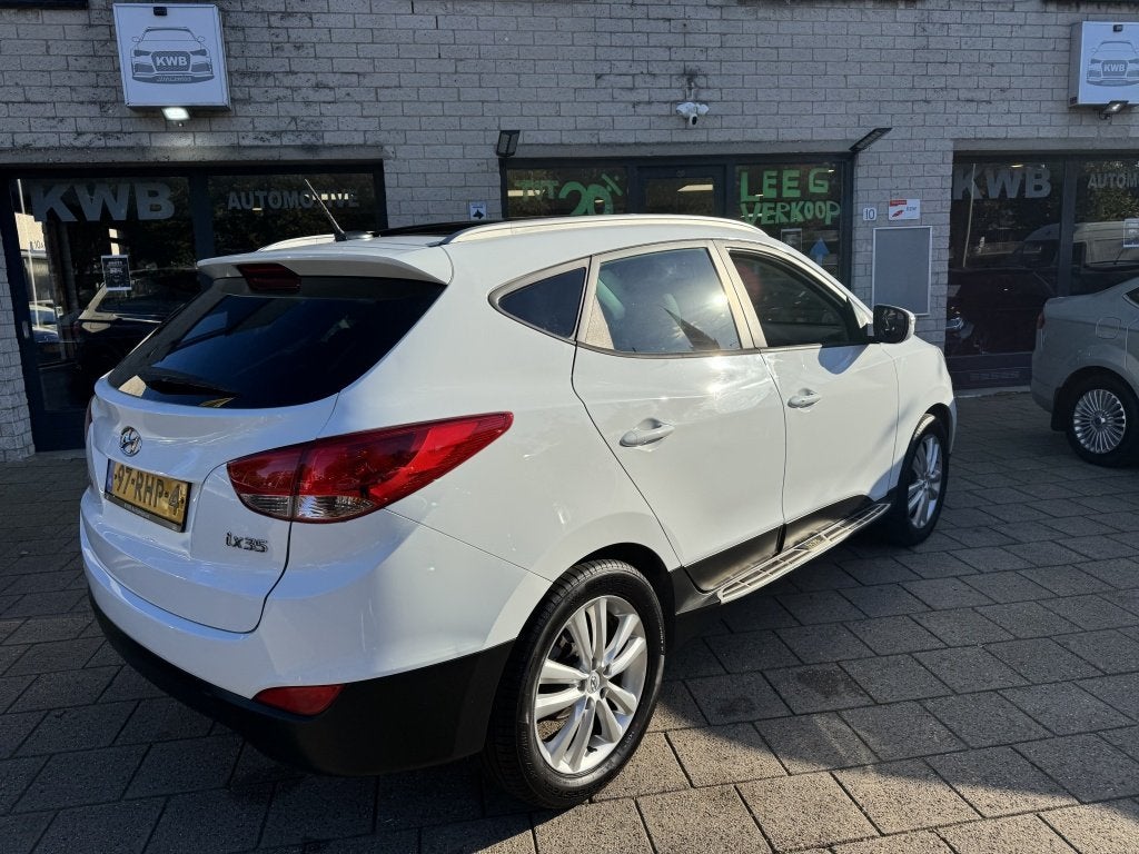 Hyundai ix35 2.0i Panoramadak Leer Automaat Camera, Auto's, Verwarmde buitenspiegels, Gebruikt, 4 cilinders, 1600 kg