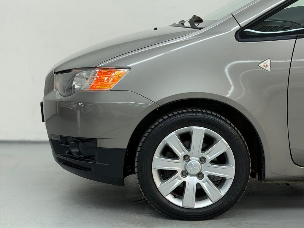Mitsubishi Colt 1.3 Invite AUTOMAAT Cruise Goed Onderhouden, Auto's, Stof, Gebruikt, 31 €/maand, Colt
