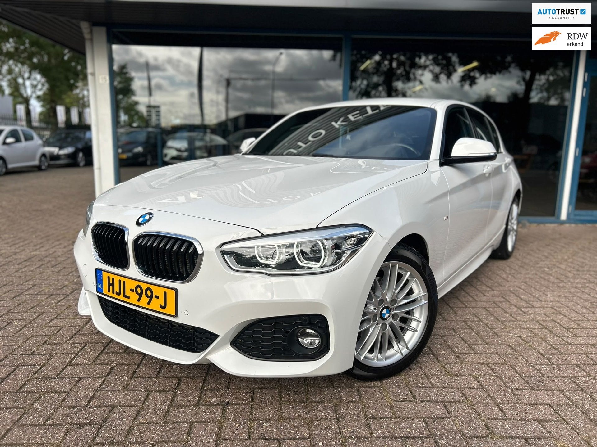 BMW 1-serie 118i Edition Sport Line Shadow High Executive| M, Auto's, Gebruikt, Met garantie (alle), Wit, Leder