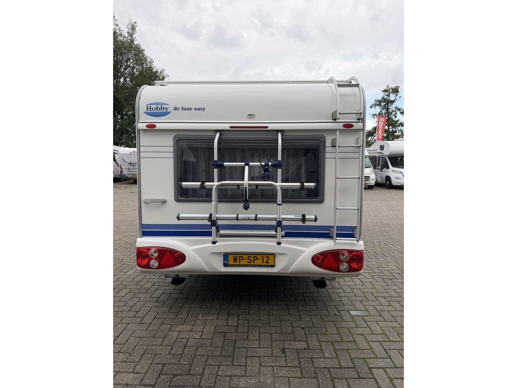 Hobby De luxe Easy 495 UK Kinderkamer, Caravans en Kamperen, Overige typen, Rondzit, Hobby, Bedrijf