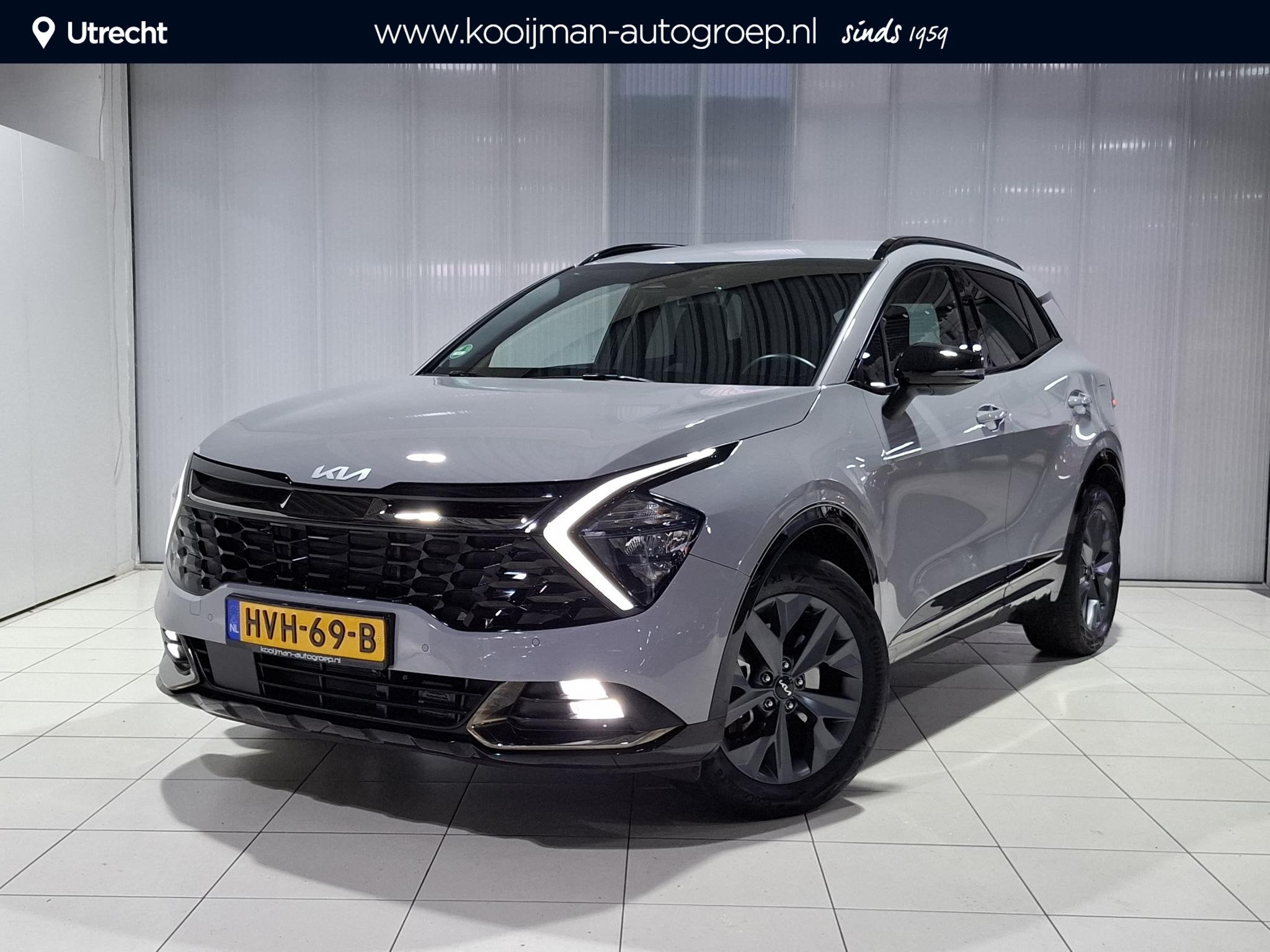 Kia Sportage 1.6 T-GDi Hybrid Dark Edition Stoel en verwarmi, Auto's, Verwarmde buitenspiegels, Gebruikt, Euro 6, 4 cilinders