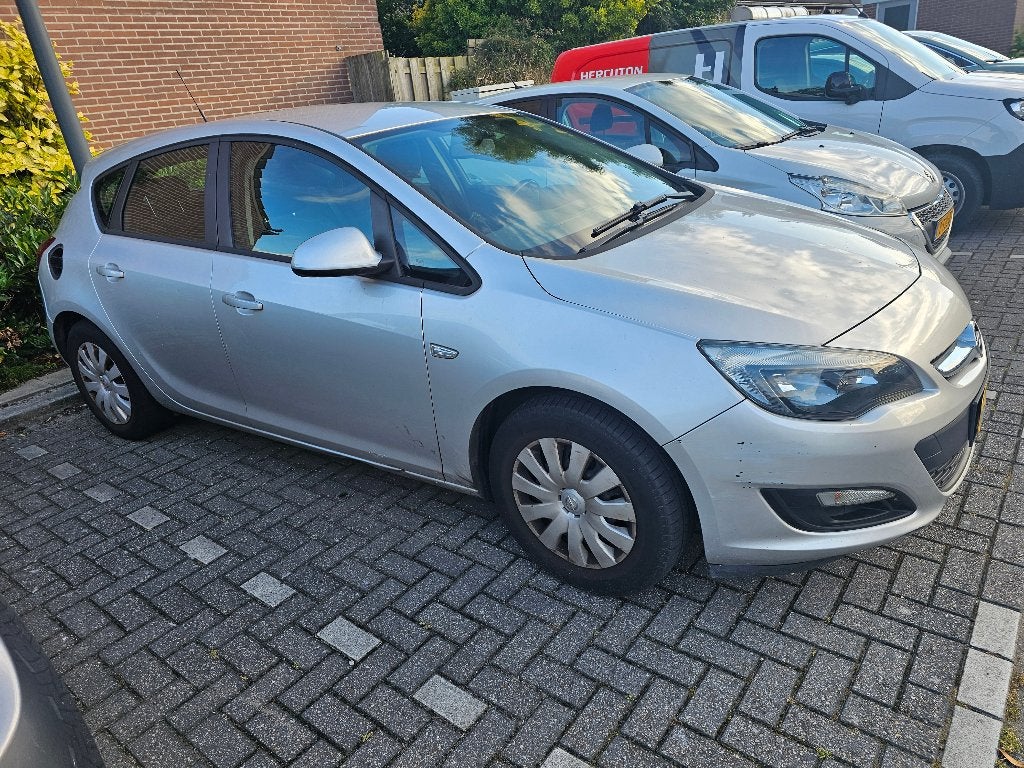Opel Astra 1.4 Ecotec 74KW 5-D 2015 Grijs, Auto's, Voorwielaandrijving, Stof, 4 cilinders, 100 pk