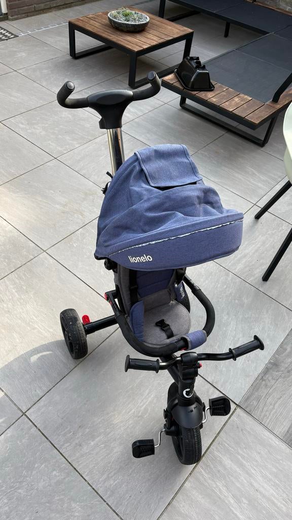 Lionelo driewieler met duwstang en zonnekap blauw, Ophalen, Zo goed als nieuw, Velgrem, Duwstang