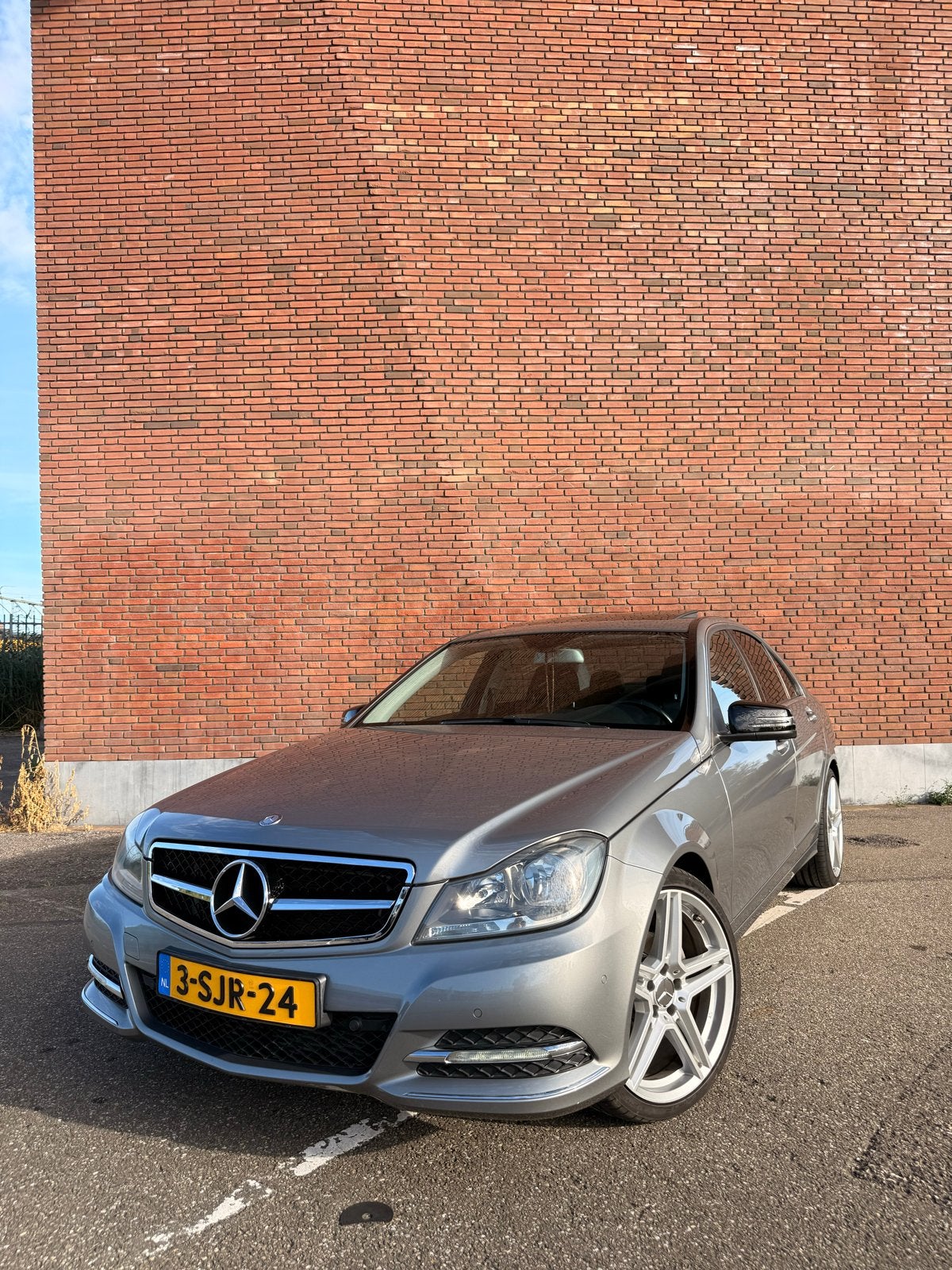 Mercedes-Benz C-Klasse 1.6 C180 Sedan AUT 2013 Grijs, Auto's, Achterwielaandrijving, 1800 kg, Leder en Stof, 1595 cc