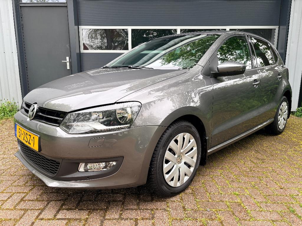 Volkswagen Polo 1.6 TDI 66KW 2012  Org. NL - NAP - Navi, Auto's, Volkswagen, Voorwielaandrijving, Euro 5, Stof, Zwart