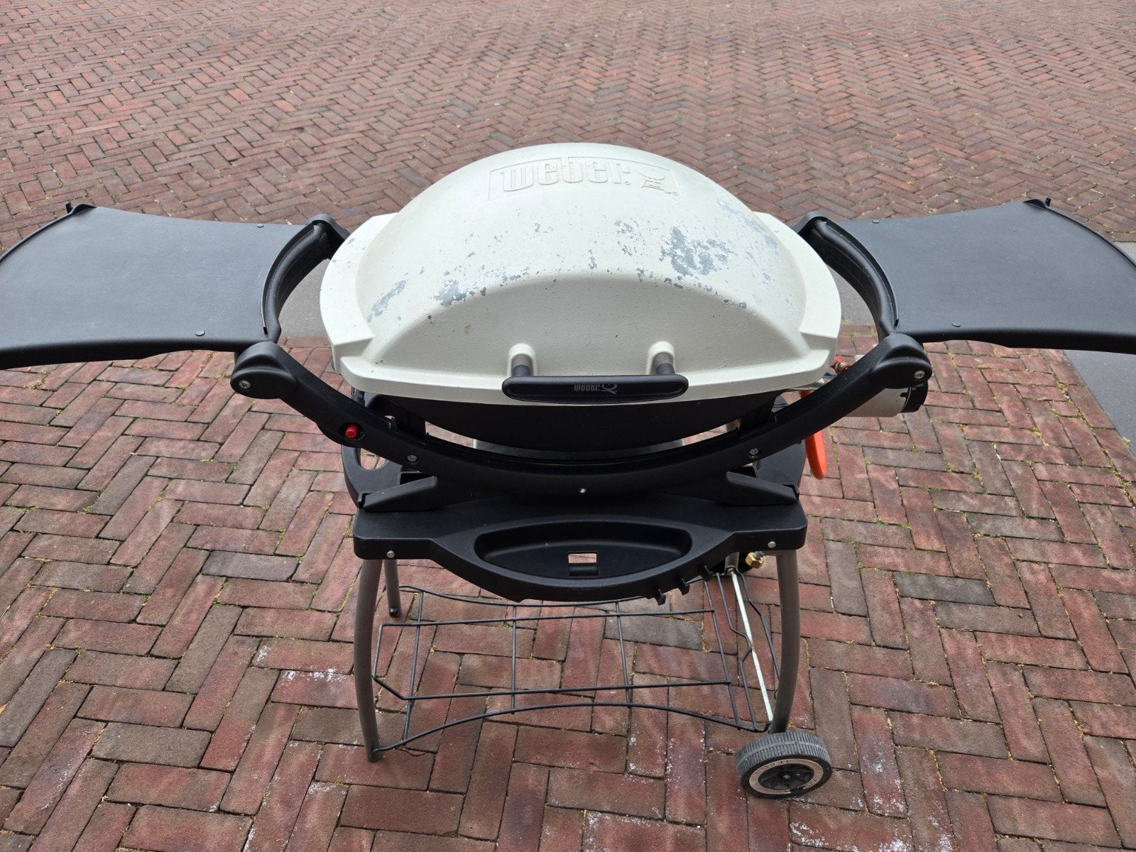 Weber Q1000 gasbarbecue met rolonderstel en gasfles, Ophalen