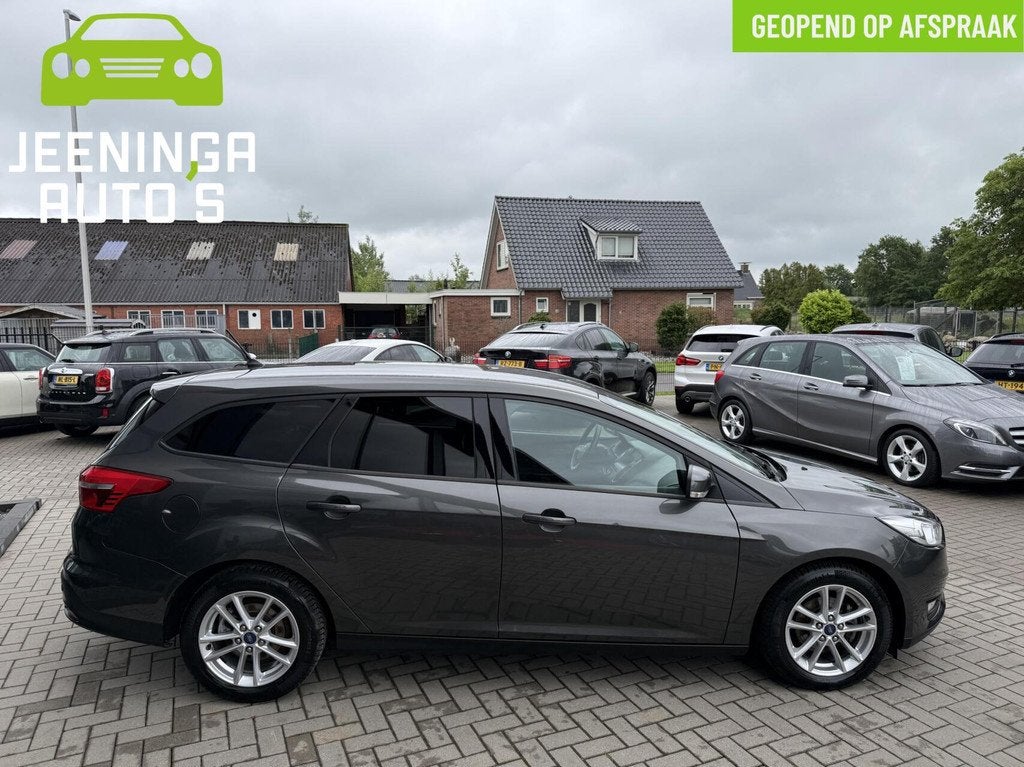 Ford Focus Wagon 1.0 Titanium|Clima|Navi|Trekhaak, Gebruikt, Origineel Nederlands, Handgeschakeld, 1216 kg