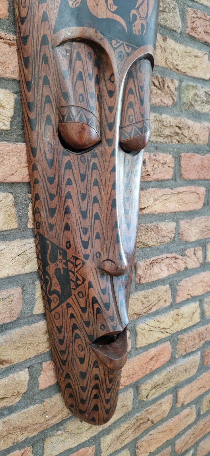 Afrikaans masker, Ophalen