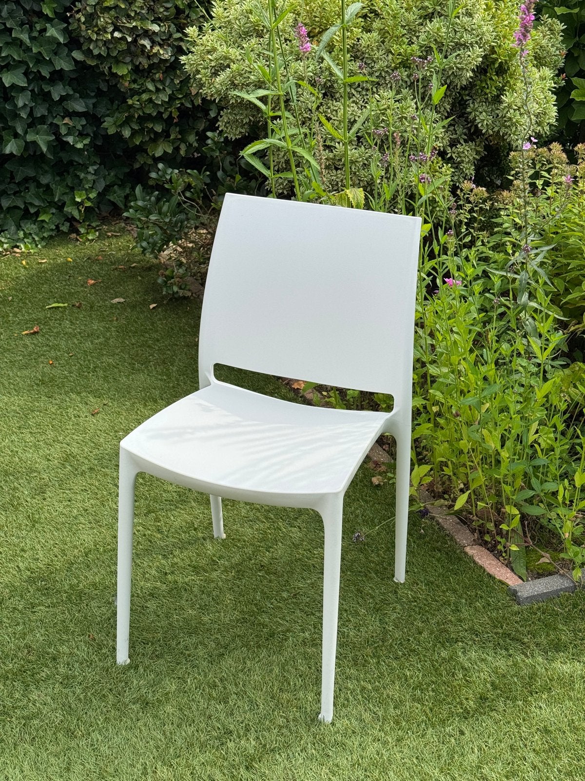 Set van 4 witte kunststof stoelen, Kunststof, Gebruikt, Wit, Ophalen of Verzenden