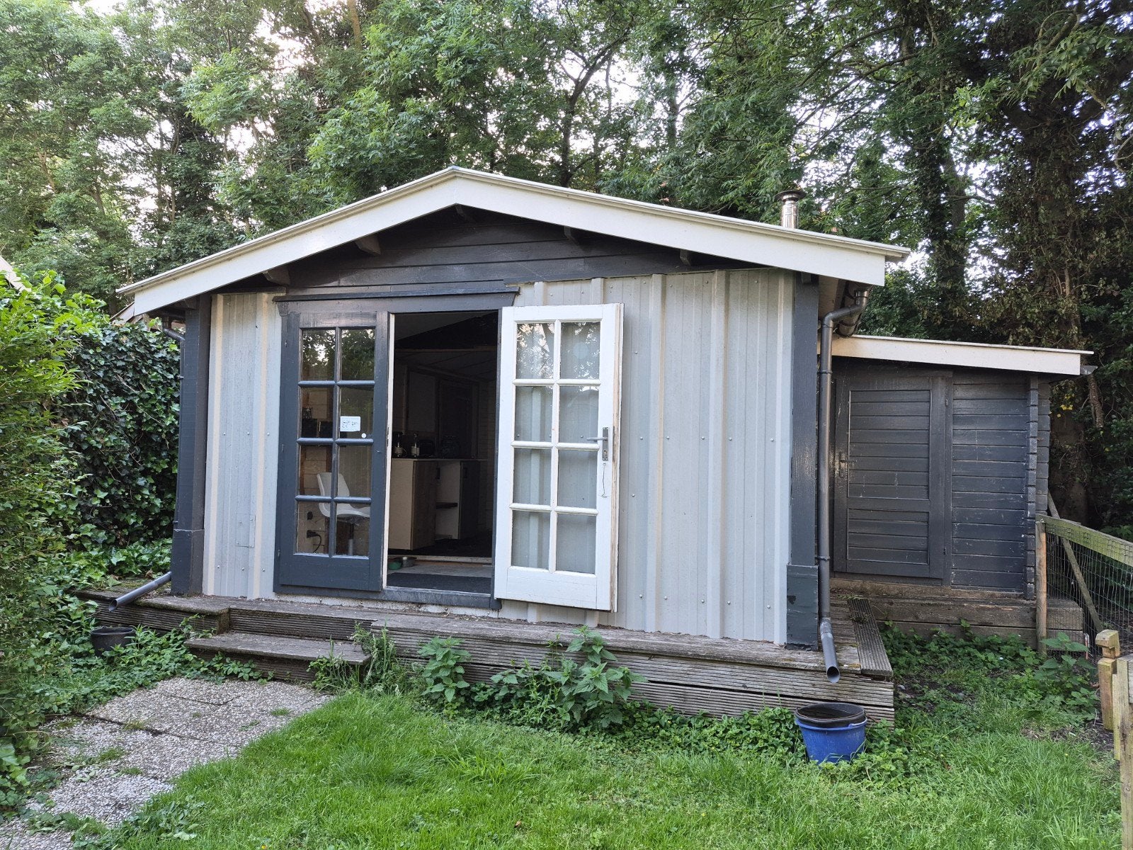 Ruime houten tuinhuis met dubbele deuren en aanbouw, Gebruikt, Ophalen of Verzenden, 400 cm of meer, 500 cm of meer