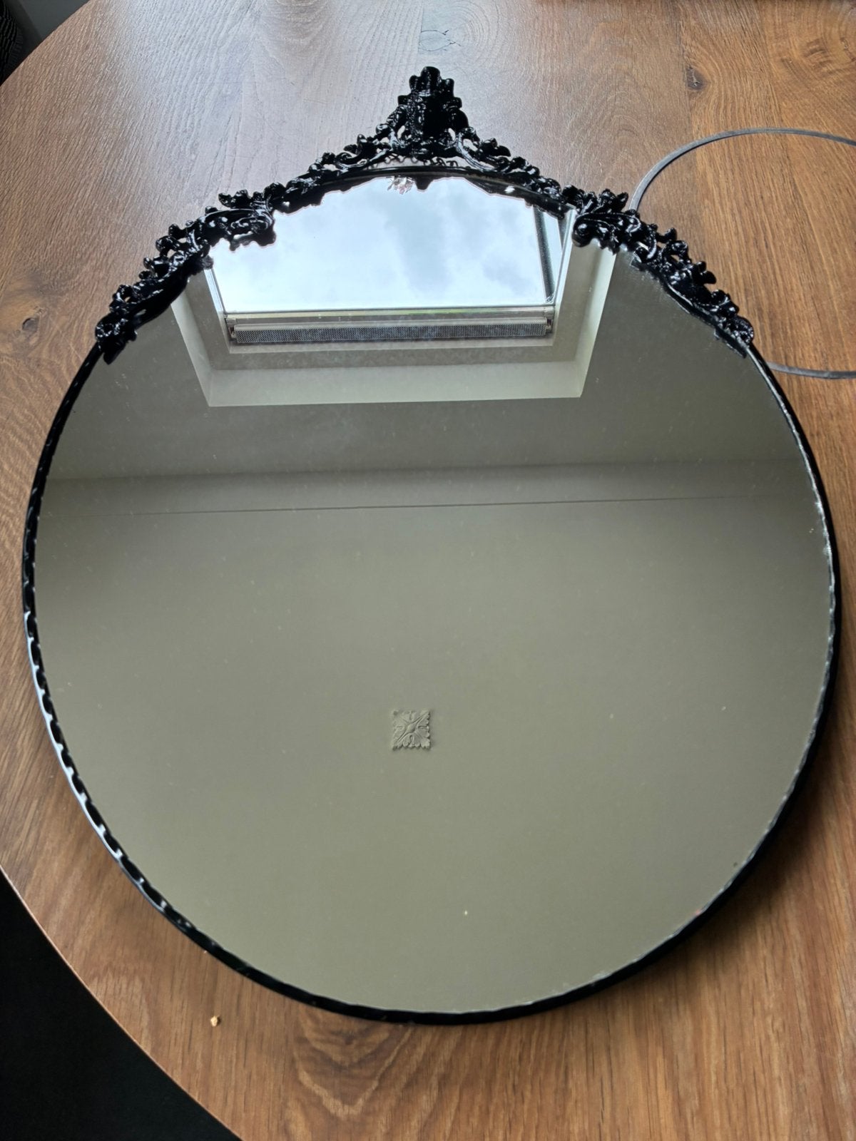 Oude koperen spiegel/zwart, Ophalen of Verzenden, Ovaal, Minder dan 50 cm