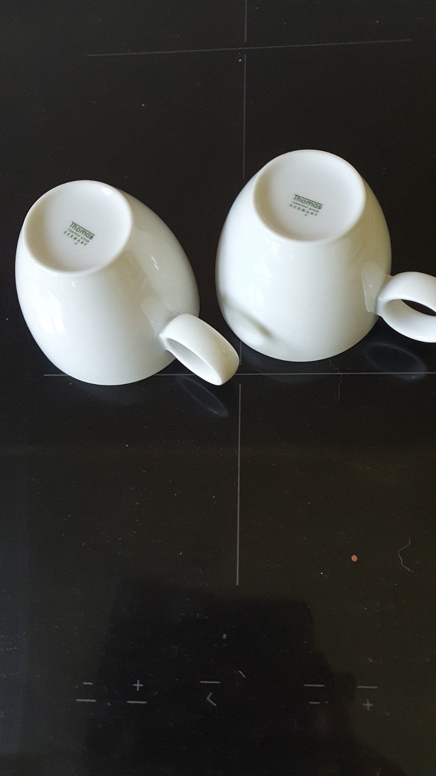 Twee witte Thomas Rosenthal Group Germany kopjes, Ophalen
