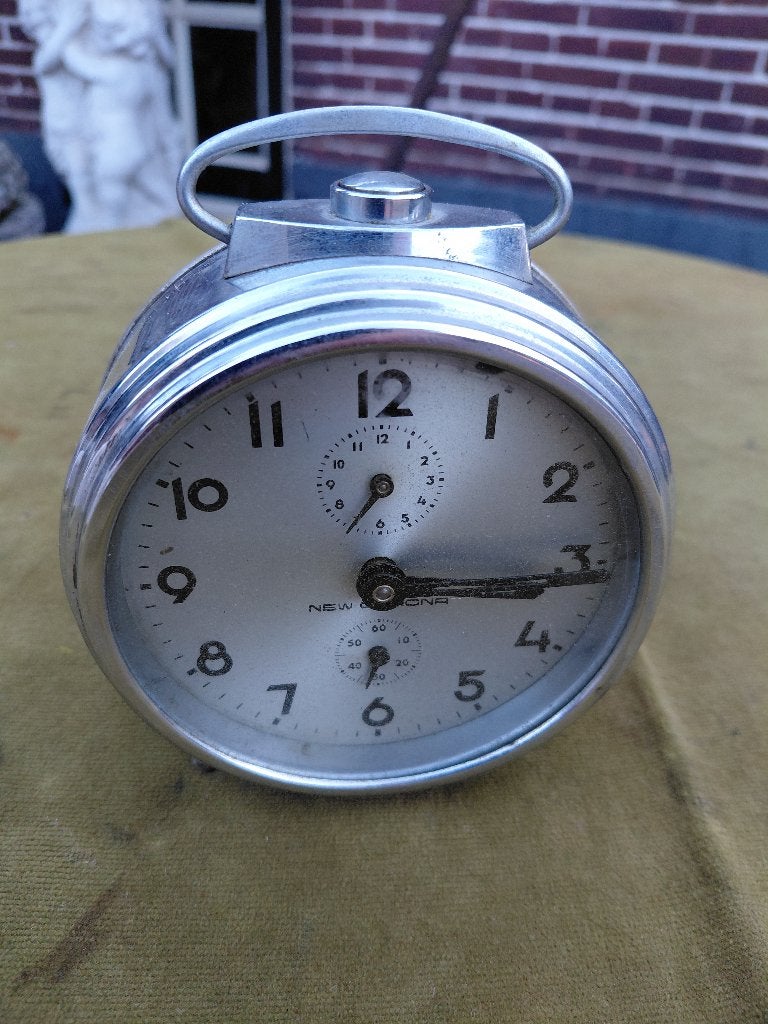 Vintage mechanische chromen wekker, merk New Corona., Antiek en Kunst, Antiek | Klokken, Verzenden