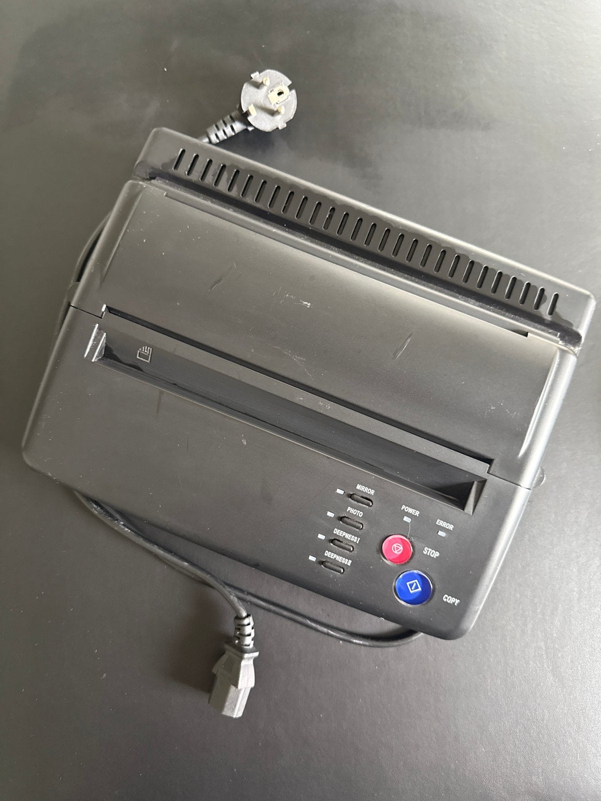 Thermal tattoo stencil printer, Ophalen