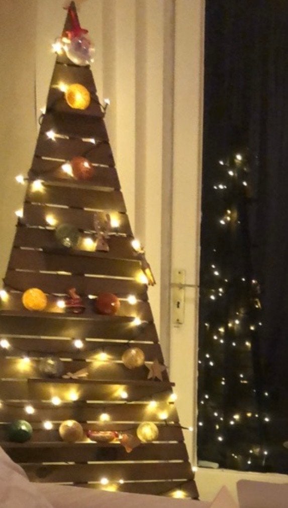 Houten kerstboom, Ophalen