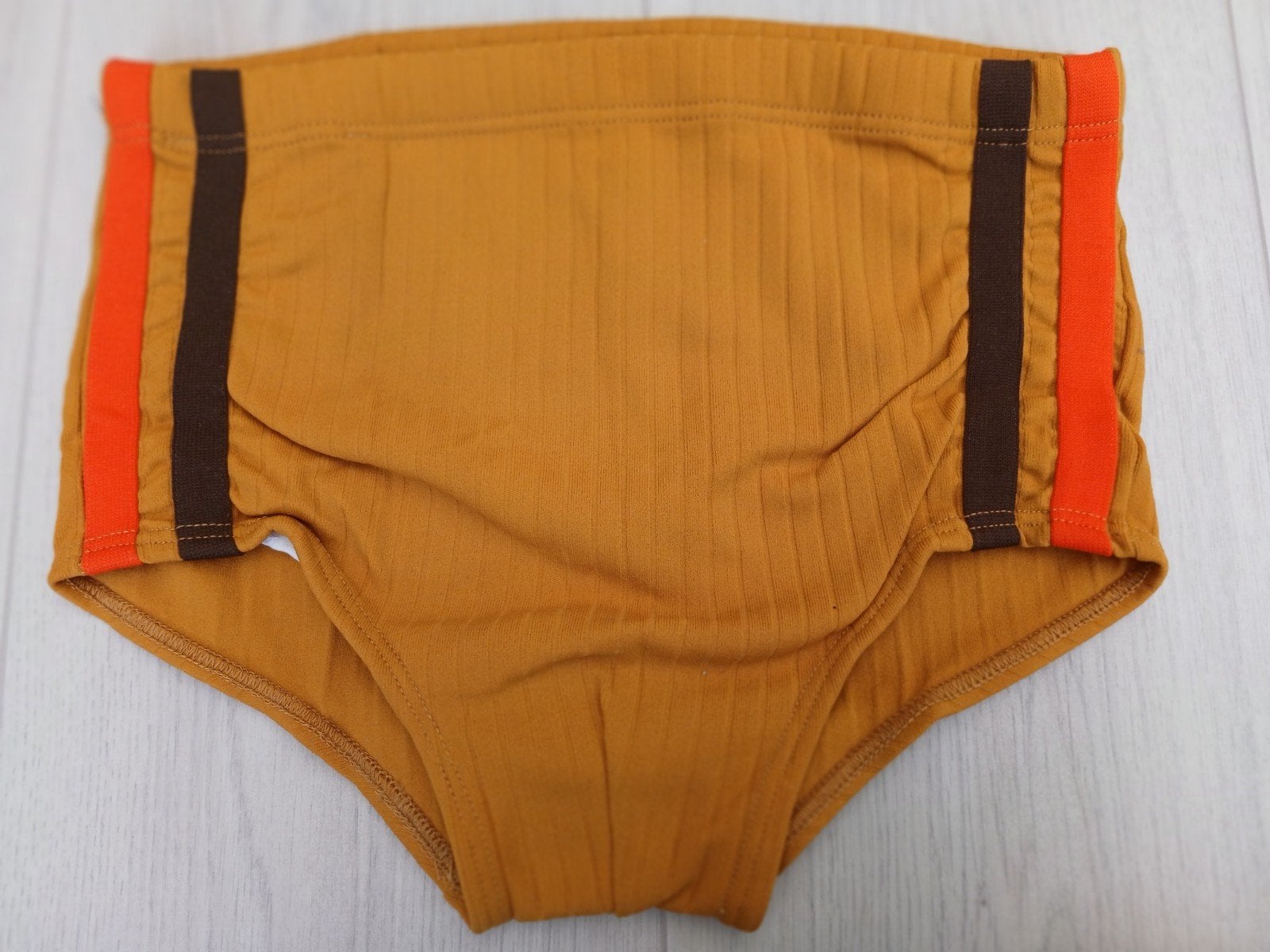 Nieuwe Helanca nieuwe okergele zwembroek maat S/4, Geel, Nieuw, Ophalen of Verzenden, Zwembroek of Short