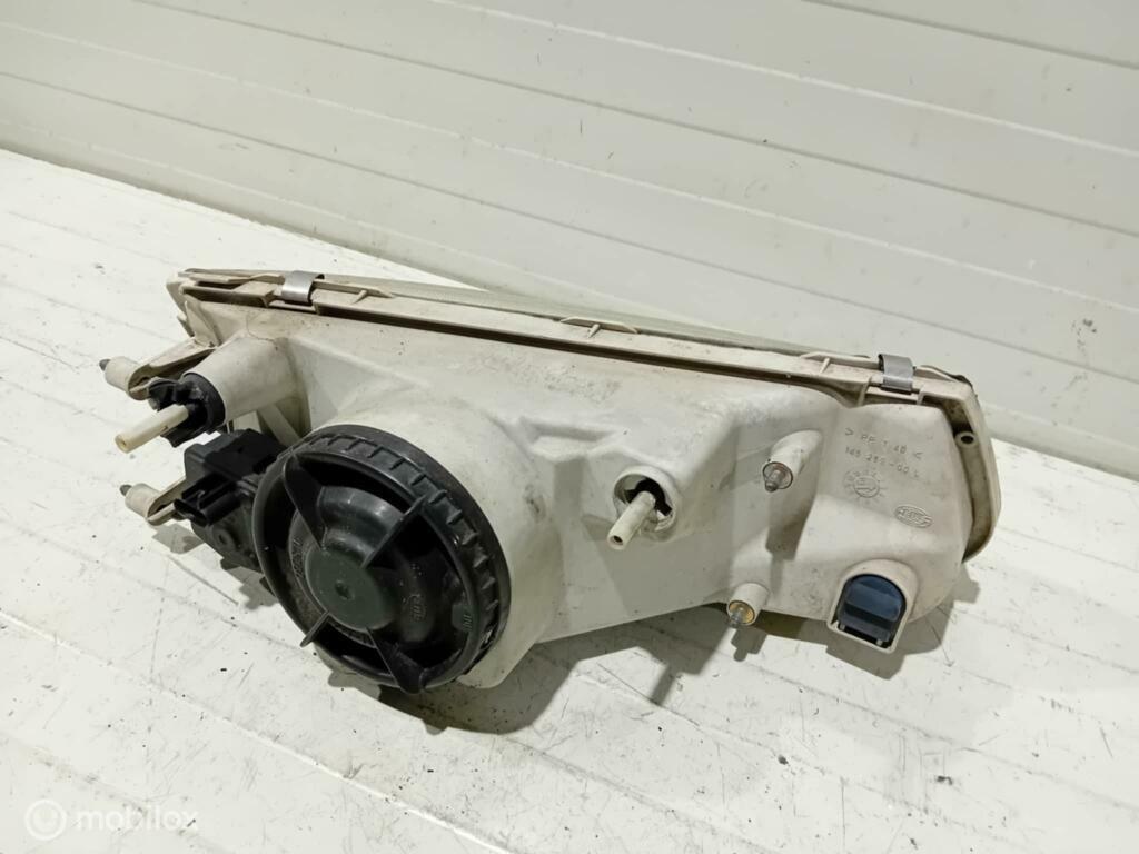Koplamp Mitsubishi Carisma 14525900, Gebruikt, Ophalen of Verzenden