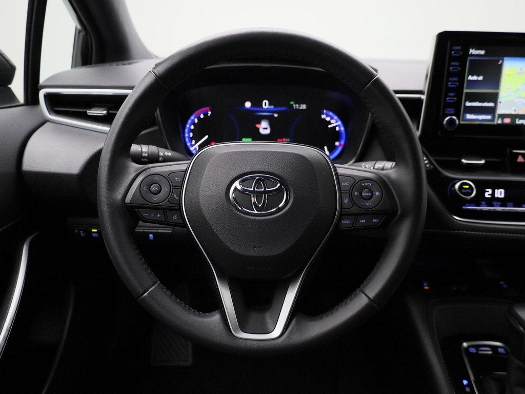 Toyota Corolla 1.8 Hybrid Business Plus | Automaat | Stoel v, Auto's, Toyota, 12 maanden, 450 kg, Gebruikt, 4 cilinders