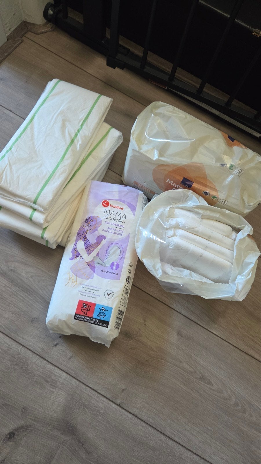 Kraamverband en matrasbeschermers na bevalling, Ophalen